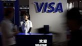 US banks to see modest hit from deal to lower swipe fee by Visa, Mastercard