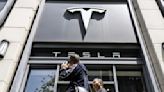 Tesla plans more job cuts as two senior executives leave, report says