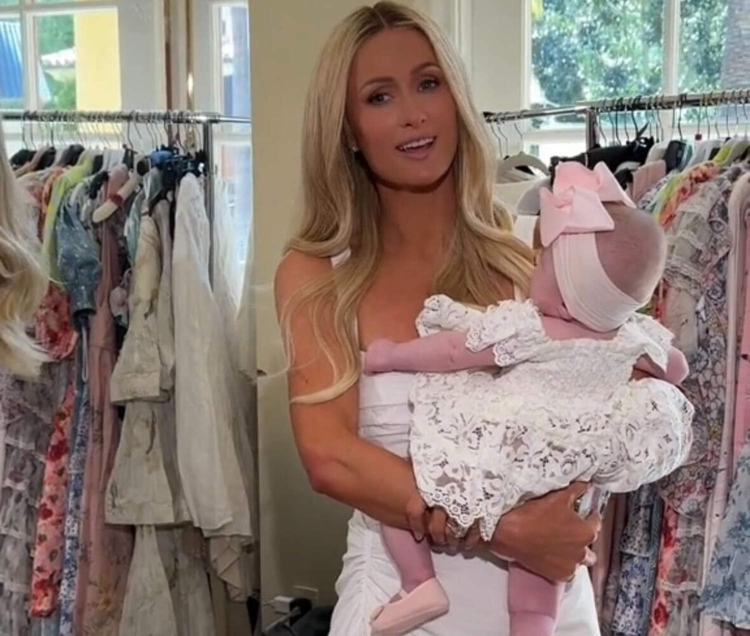 Paris Hilton jokes that her 5-month-old daughter could use a spray tan during their photo shoot