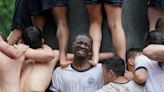 U.S. Naval Academy freshmen climb Herndon Monument - May 16, 2024