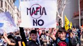 Italy expands controversial program to take kids from mafia families