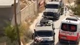 Video shows wounded Palestinian man strapped to Israeli military jeep as IDF says soldiers violated protocol