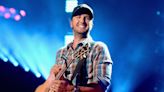 Luke Bryan slips on stage, jokingly threatens to sue fan: 'My lawyer will be calling'