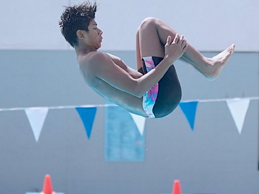 Freshman Josiah Rosales-Cristales learned to dive via YouTube; now he's City champion