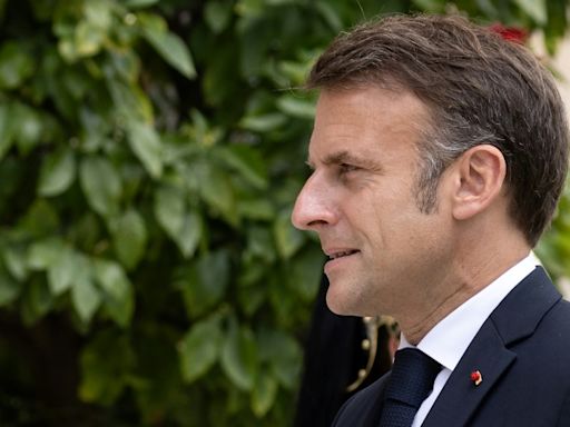 Macron pledges 'change' as French far right eyes parliament rout