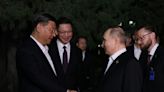 Putin in trade push on final day of China trip