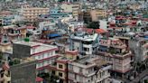 18 dead after plane slips off runway and crashes at Nepal airport