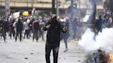 Kenya's president calls the storming of parliament a security threat, vows calm 'at whatever cost'