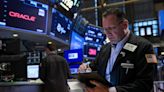 Stocks end week lower amid earnings, strong economic data: Stock market news today