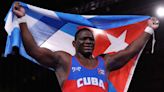 Cuban wrestler Mijain Lopez returns to break Olympic record he shares with Michael Phelps