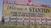 'Home of 3,000 Friendly People and a few old Sore Heads' | The story behind the larger-than-life signs in Stanton