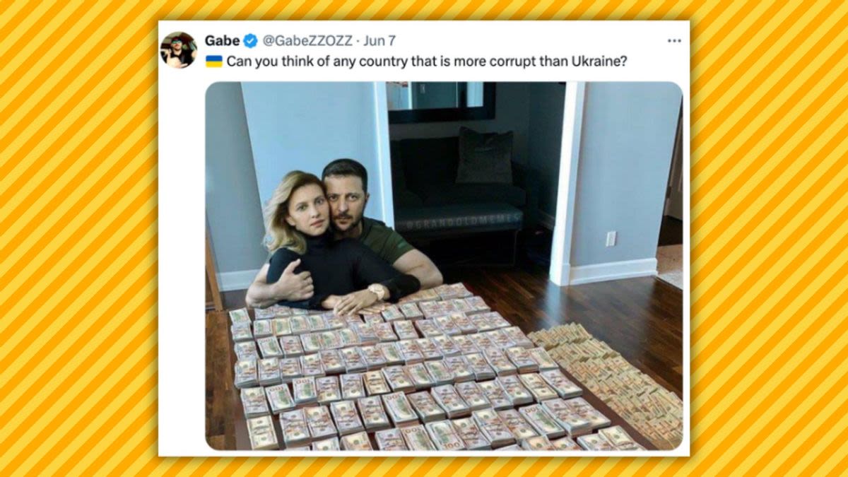 Fact Check: What To Know About This Photo of Zelenskyy Supposedly Posing with Stacks of Money