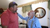 Former Patriot Joe Andruzzi has special delivery for 91-year-old Rudy Longo of Stratham