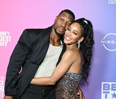 Captain Save-A-Kang? Rumor Alleges Meagan Good Coretta Covers Jonathan Majors' Bills & Child Support, Insiders...