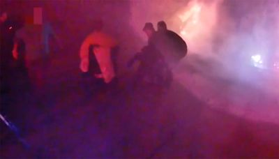 Kenosha house fire: Officers, civilian help rescue people inside