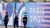 Central Paris locks down for Olympics as athletes arrive