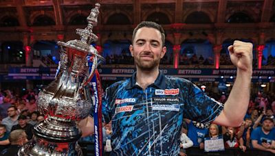 World Matchplay Darts: Luke Humphries joins the greats after beating Michael van Gerwen to claim title in Blackpool