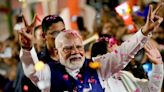The Latest | Prime Minister Modi's coalition clinches parliamentary majority in India's election