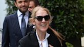 Celine Dion is in great spirits as she arrives in Paris for Olympics