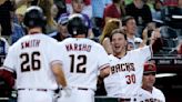 Smith, Walker homers spoil Greinke's return to Arizona, 9-5