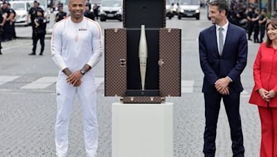 Olympic Torch Reaches Paris in Elegant Style