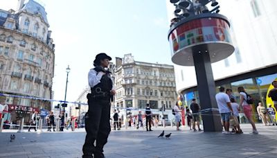 Security guard disarms knifeman after girl, 11, and woman, 34, stabbed in Leicester Square