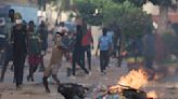 Senegal violence threatens country's stability as experts call on government to instill calm