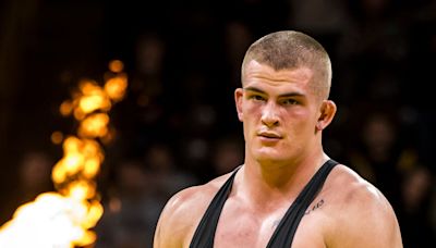 Ben Kueter temporarily stepping away from Iowa football to focus on wrestling dreams