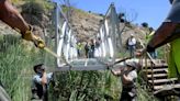 Volunteers build temporary crossing at Malibu Creek State Park's 'MASH' set