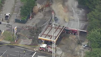 Smoke billows after large fire breaks out at gas station off I-75