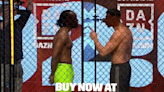 Video: KSI, Tommy Fury have bizarre faceoff separated by plexiglass inside small cage