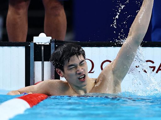 Swimming-China's Pan smashes own 100m freestyle world record for gold