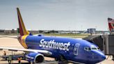 A Southwest pilot leaned out of his cockpit window to retrieve a passenger's lost cellphone after it was left behind at a departure gate