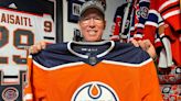 Diehard Oilers fans from Saskatoon cheer with their hearts, and statistics