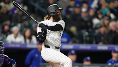 Charlie Blackmon's 2-run double in the 8th inning leads Rockies past Rangers 4-2