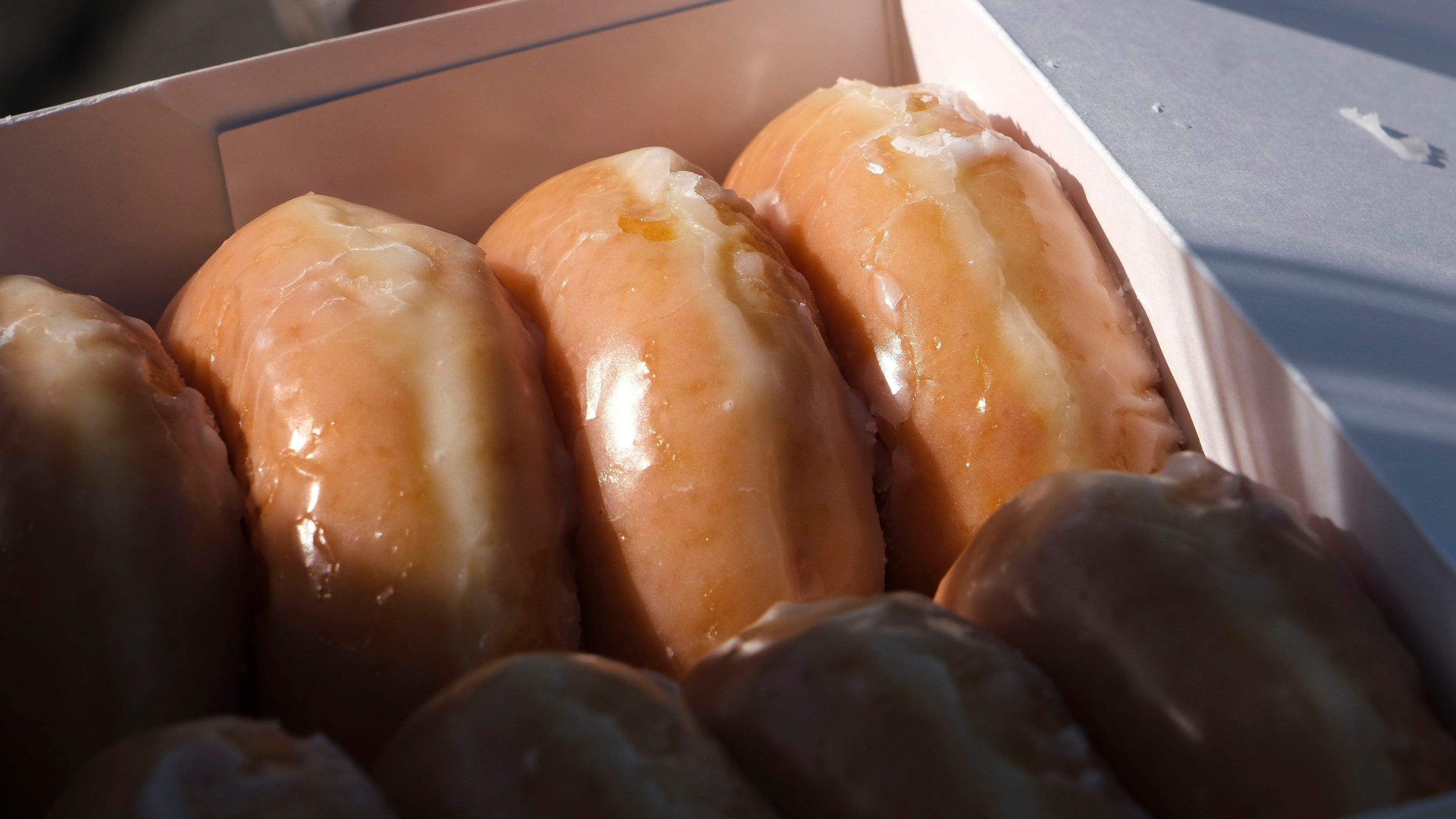 Krispy Kreme deal: Get half-off and $1 BOGO deals on original glazed dozens this week