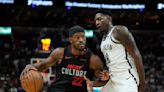 Butler scores 36, Robinson adds 26 and Heat top Nets 122-115 to win 7th straight