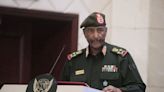 Sudan’s military says its top commander survived a drone strike that killed 5 at an army ceremony