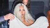 Kim Kardashian hides under sheet as she leaves Met Gala after backlash