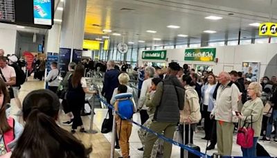 Glasgow Airport dubbed 'shambles' as holidaymakers left waiting in huge queues