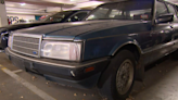 Mystery surrounds abandoned car, parked at Melbourne shopping centre for over a decade