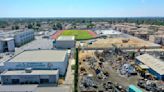 Scrapyard explosion rattles Watts high school on first day of classes