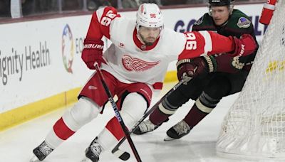 The Sharks acquire Jake Walman and a 2nd-round draft pick from the Red Wings