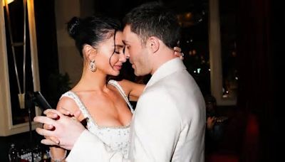 Amy Jackson holds her son's hand as she and Ed Westwick host engagement dinner party in London. See pics