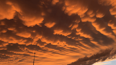 Enigmatic mammatus clouds lend an eerie beauty to post-storm landscape