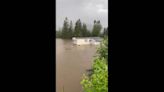 Norway: Mobile home washes away after severe flooding from Storm Hans