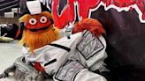 Flyers Mascot Gritty Bonds with Famous Emotional Support Alligator at Philadelphia Hockey Game