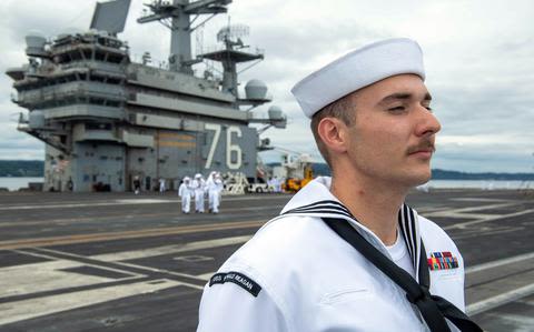 USS Ronald Reagan arrives at new homeport near Seattle as Navy carriers crisscross the Pacific