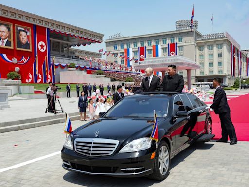 Putin and Kim Jong-un exchange gifts including luxury limousine and hunting dogs