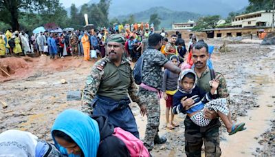 India landslide toll hits 122 as rain hampers rescue work